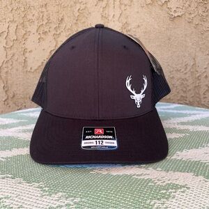 Richardson Black Trucker Hat with White Deer Logo